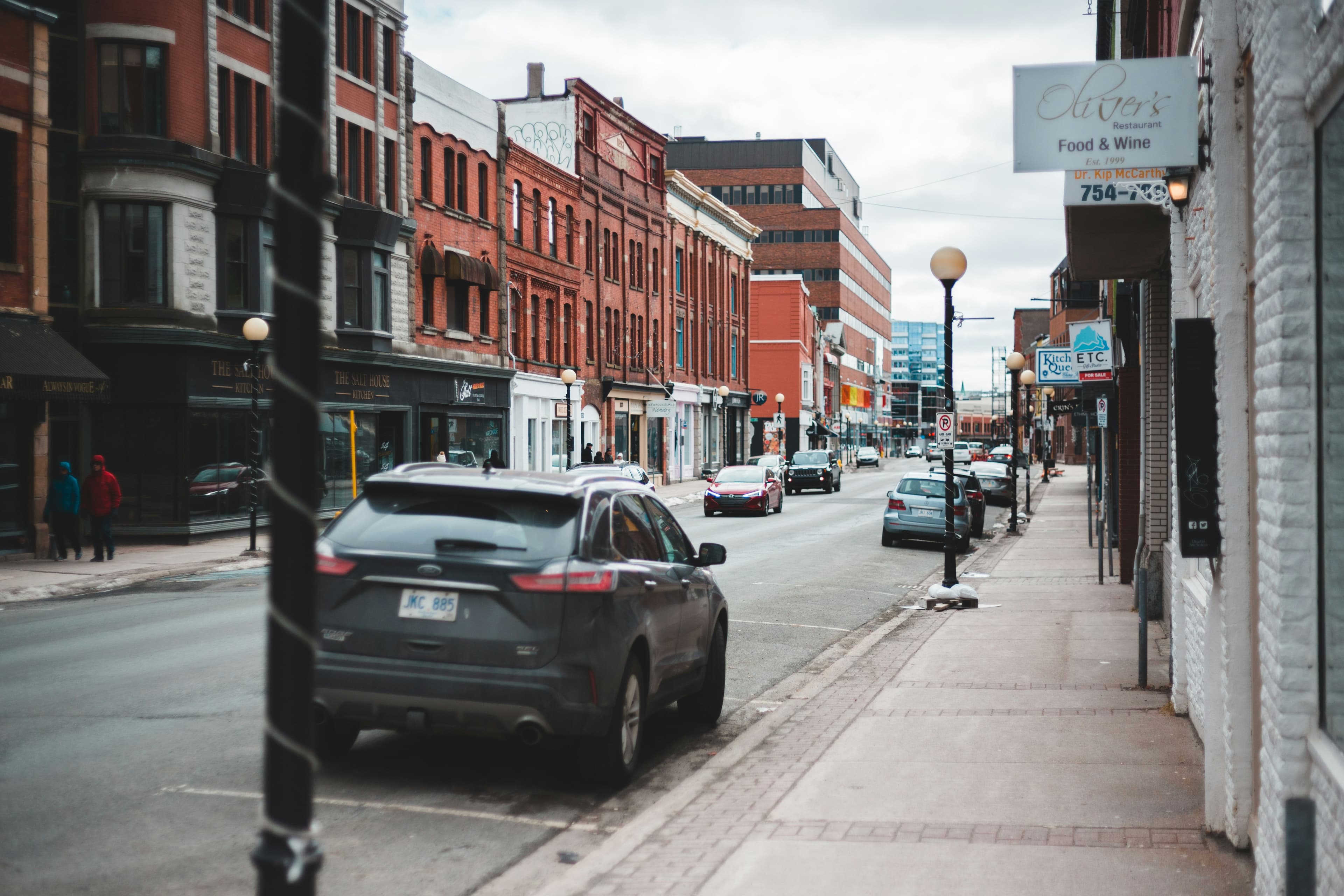 Photo by <a href="https://unsplash.com/@introspectivedsgn?utm_source=unsplash&utm_medium=referral&utm_content=creditCopyText">Erik Mclean</a> on <a href="https://unsplash.com/photos/cars-parked-on-sidewalk-near-buildings-during-daytime-Frb0U42Sw4c?utm_source=unsplash&utm_medium=referral&utm_content=creditCopyText">Unsplash</a>